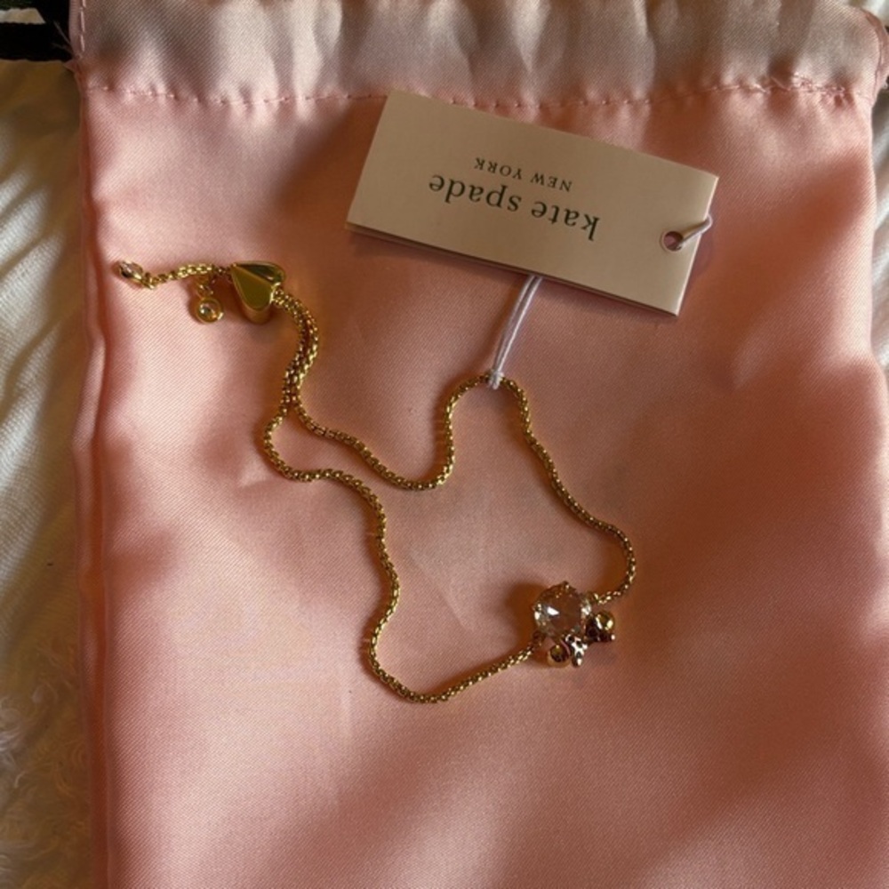 Kate Spade Gold and diamond  Pink gem Charms adjustable Disney bracelet